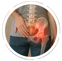 Person holding their lower back and hip, with a visible spine and pelvis overlay highlighting inflammation in the right hip area, wearing casual jeans and a gray T-shirt